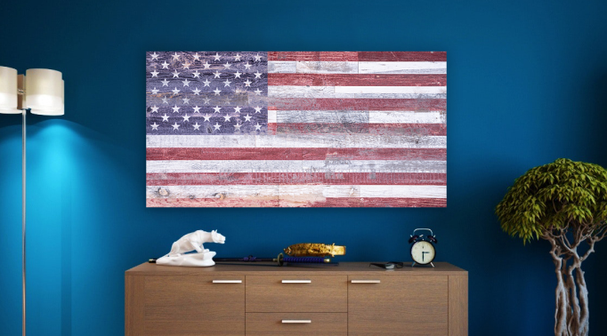 wall art of american flag printed on wood hanging on wall
